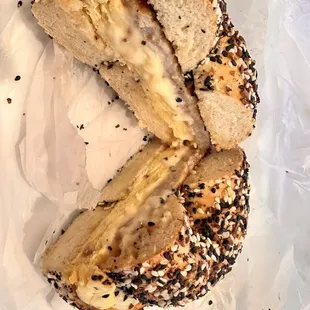 Everything bagel toasted, Classic egg and cheese, add sausage.