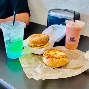 Swamp Water Refresher, Chicken Egg &amp; Cheese on Everything Bagel, Asiago Cheddar Bagel with Cream Cheese, and Thumb Print Cookie Latte