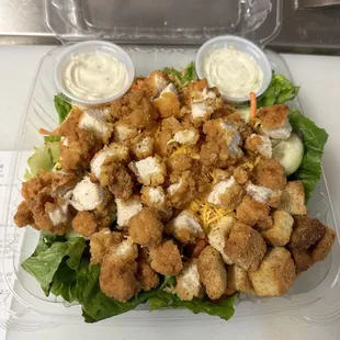 a salad in a plastic container