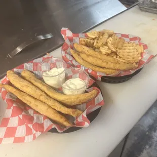 two baskets of food on a counter