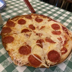 Half pepperoni half pepperoni and onion