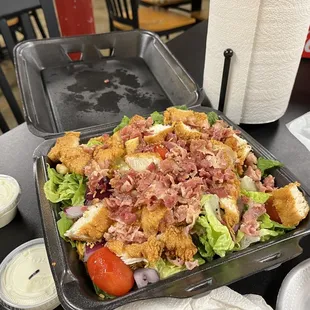 This is a BLT with chicken and no it is not for a family of 4 it is what you get in one serving.