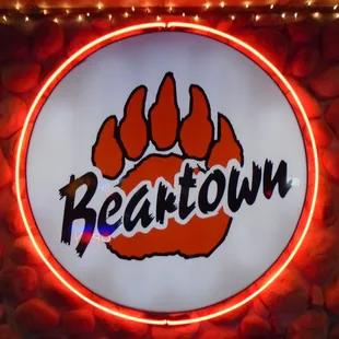 Huge sign on the wall inside the front entry.