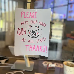 a sign posted on a table