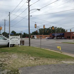 a white truck parked on the side of the road