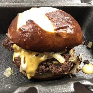 Pretzel burger with beer cheese.