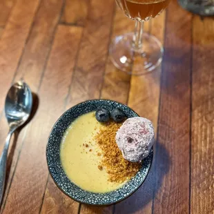 Burnt popcorn miso custard with beignet and blueberries (and peanut crumble on top for the win)