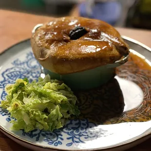 Rabbit, Smoked Ham Hock &amp; Prune Pie served with steamed Savoy cabbage