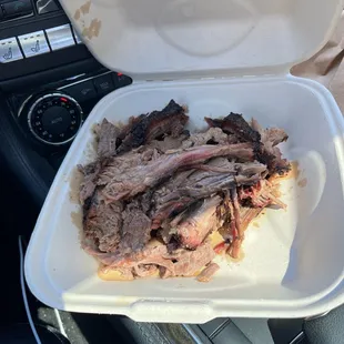 BBQ to go.    Pulled apart...not sliced.