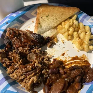 Chopped Pork, Brisket, Beans, Mac N Cheese, and garlic bread