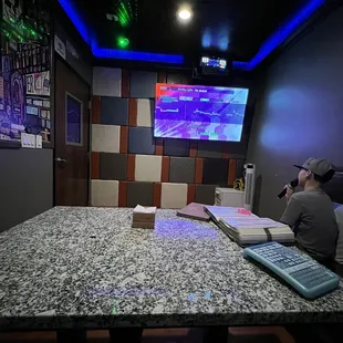 $20 hour private room. Lots of Korean songs and 90s English ones to choose from. Nothing new.