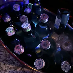 a tray of liquor bottles