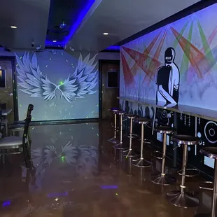 a large mural of a man with wings on the wall