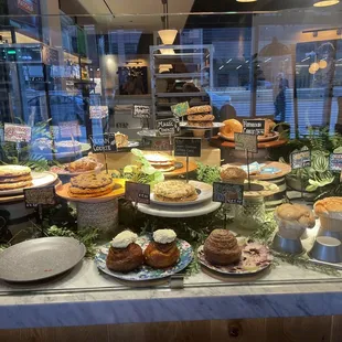 a display of pastries and desserts