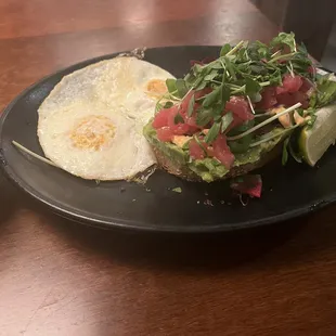 Avocado toast with 2 eggs and tuna poke