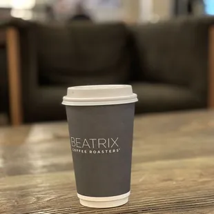 a coffee cup on a table
