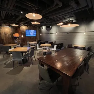 a large wooden table and chairs