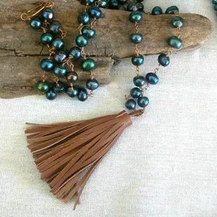 pearl and leather tassel necklace