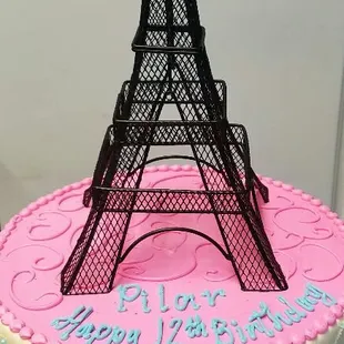 the eiffel tower in pink and blue