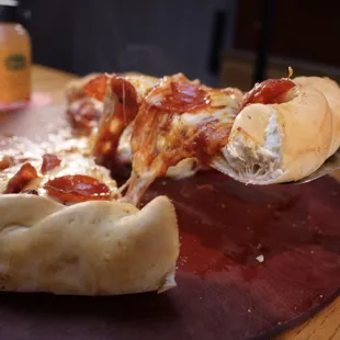 a slice of pepperoni pizza