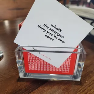 Convo starters on every table.