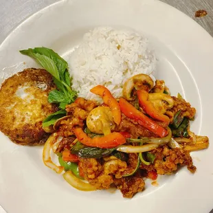 Pad Bai Kra Praw crispy pork and Thai fried egg