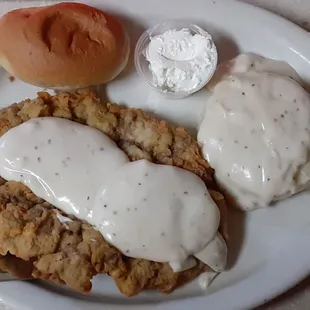 Chicken fried steak hand cut real mashed potatoes cream gravy roll