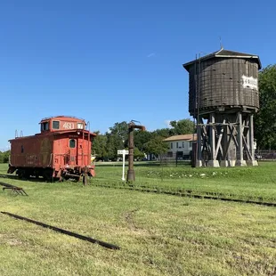 The Friaco wooden water tower &amp; BNSF caboose.
