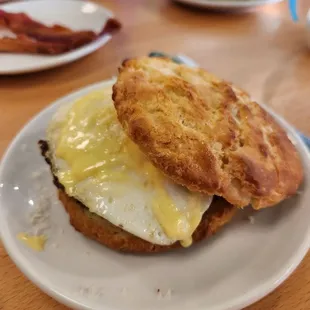 a breakfast sandwich on a plate
