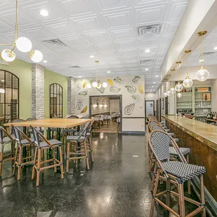 a bar with chairs