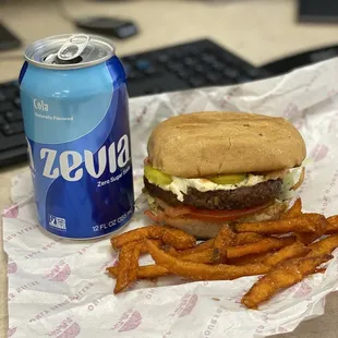 B1 burger with added vegan house made mozzarella cheese (cashew based) and tomatoes, SWEET FRIES with original seasoning, Zevia Cola..