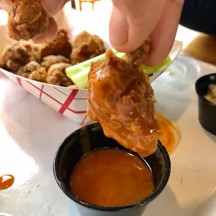 Beer Battered Cauli Bites dipped in Buffalo Sauce!