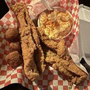 2 piece Basa (catfish) meal with potato salad.