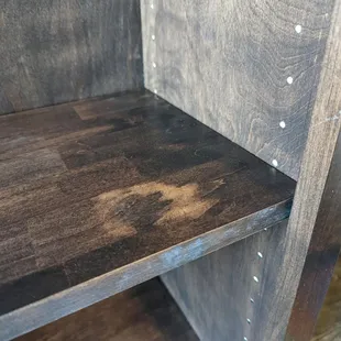 Poorly stained furniture. Rude owner