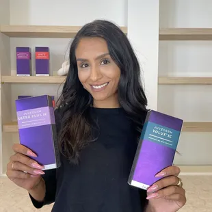 Staff with one of our Juvederm Products