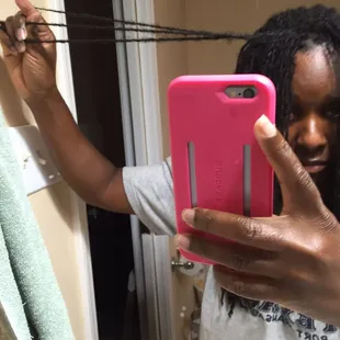 More locks clumped together.  She got lazy and began to just grab locks and knot them