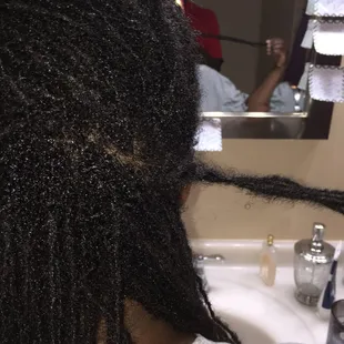 Another huge section she carelessly grabbed, knotted, and palm rolled.