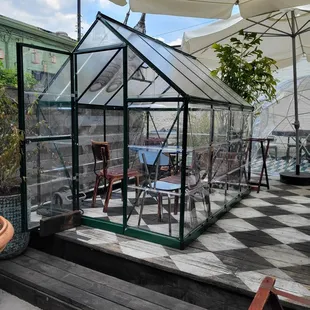 patio area with tables and umbrellas