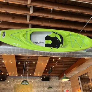a kayak hanging from the ceiling