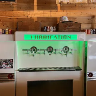 a beer dispenser in a bar