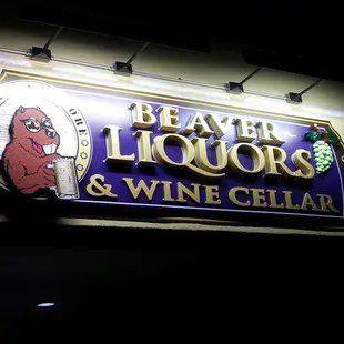 a sign for beaver liquors and wine cellar