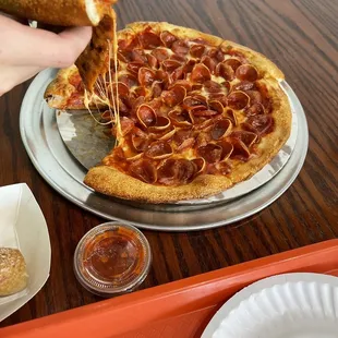 The extra pepperoni you get here