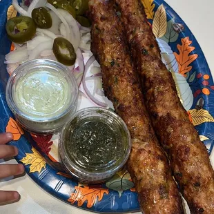 a plate of meat and vegetables