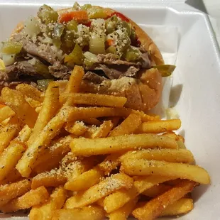 Sandwiches are stuff full. Large portion of frozen fries dressed up with Parmesan and Italian Seasonings