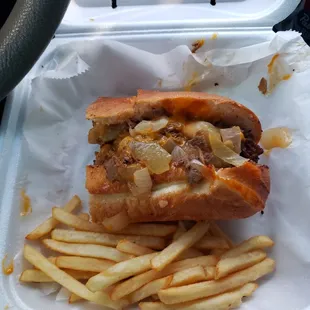 1/2 of a 10" Philly style w/ onions and whiz, plus fries.  Delicious.