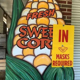 a sign for fresh sweet corn
