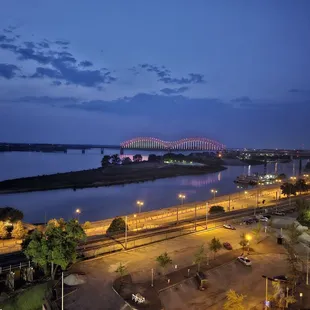 a view of a bridge at night