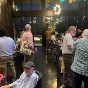 a group of people in a restaurant