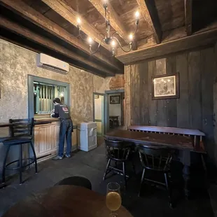 a man standing at a bar