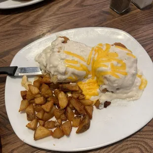 Chicken and biscuits with the best potatoes.